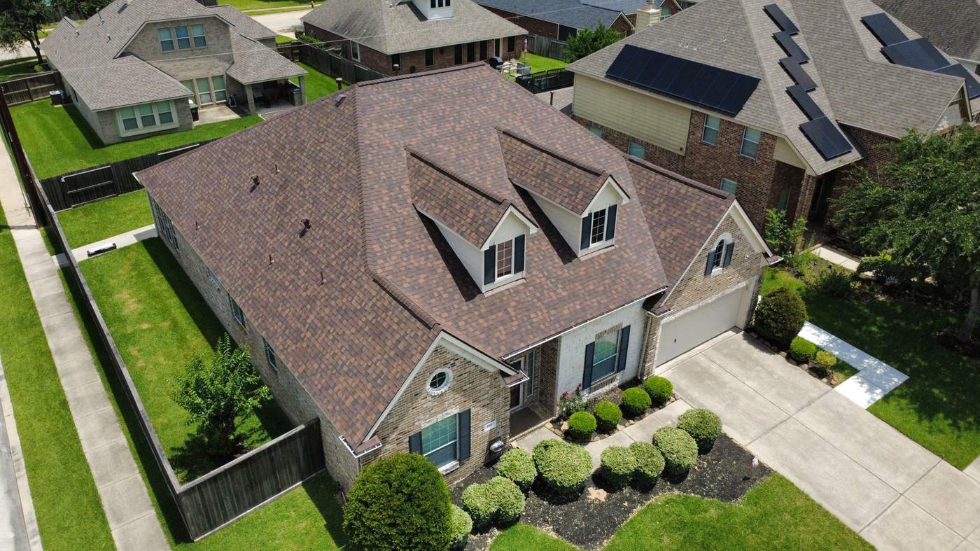 Completed roof with dormers and a cut-up roofline