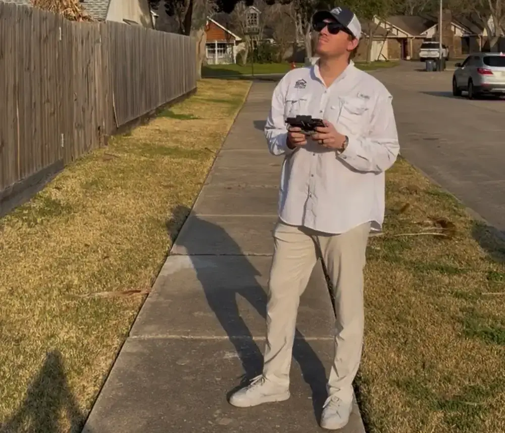 Shultz inspector in front of a home at the start of an inspection